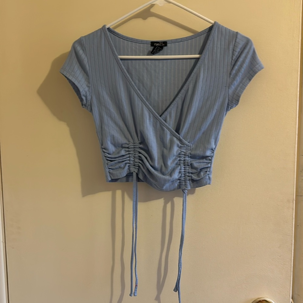 light blue crop top